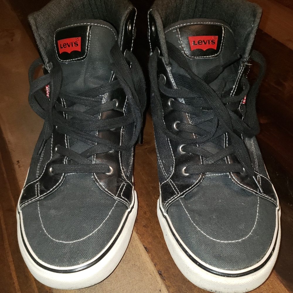 Men's size 12 Levi's hi-top tennis shoes.